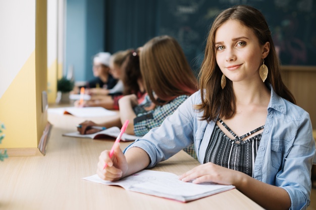student-teen-looking-camera_23-2147666625